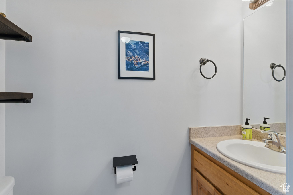 Bathroom with vanity and toilet