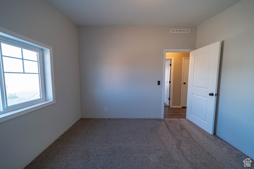 View of carpeted spare room