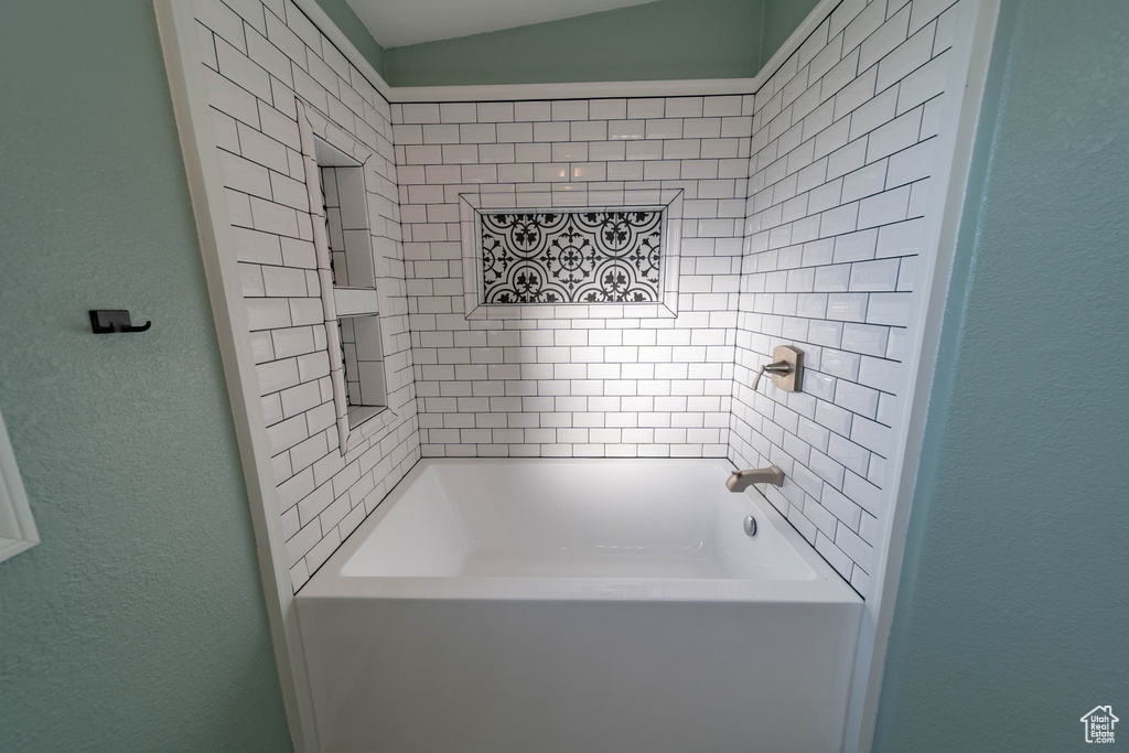 Bathroom featuring shower / bathtub combination