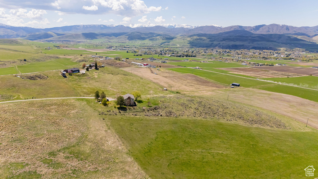Aerial view of sparsely populated area featuring a mountainous background