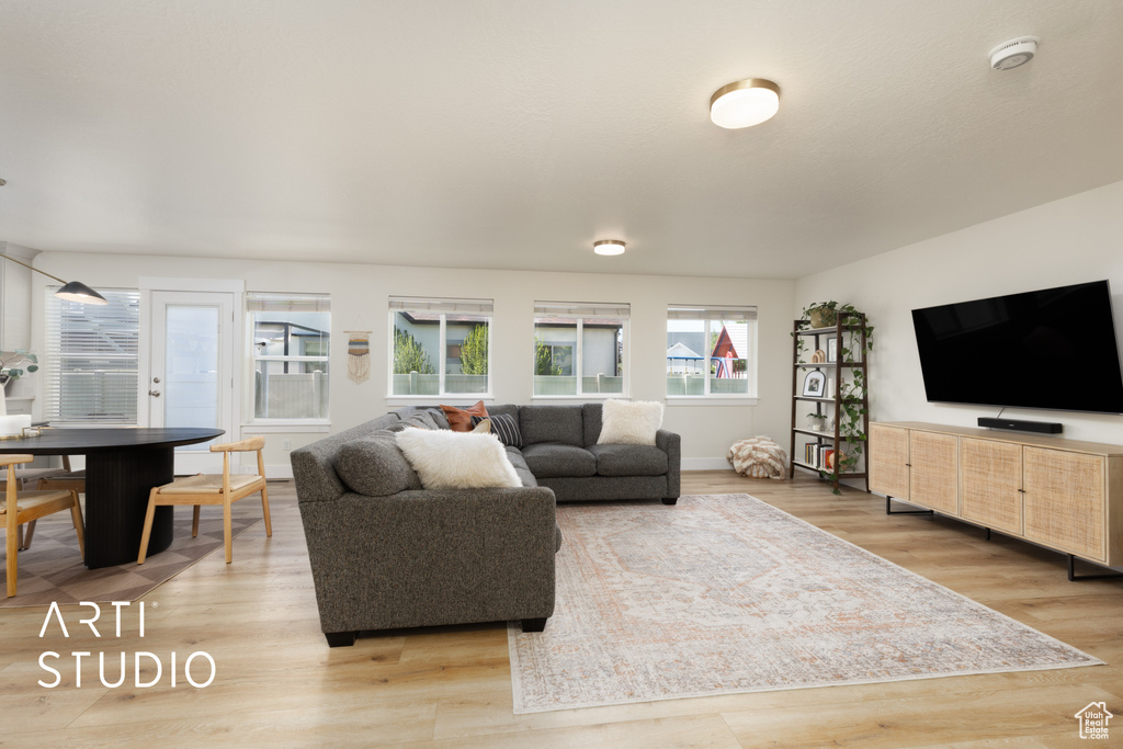 Living area featuring light wood finished floors