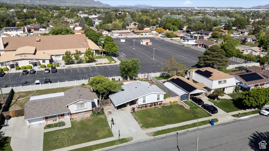 Aerial view of residential area with a mountain backdrop