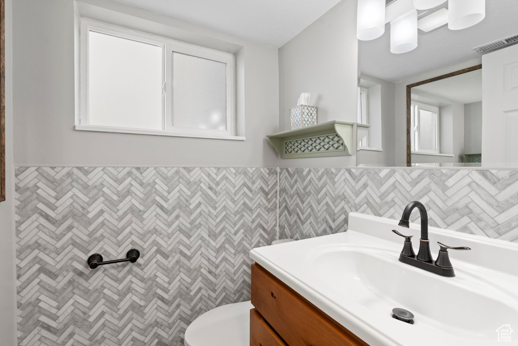Bathroom with vanity and toilet