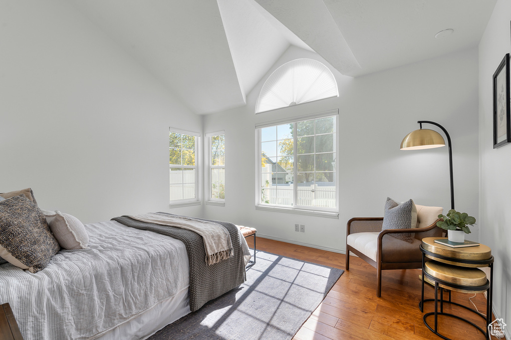 Bedroom featuring vaulted ceiling and light wood finished floors