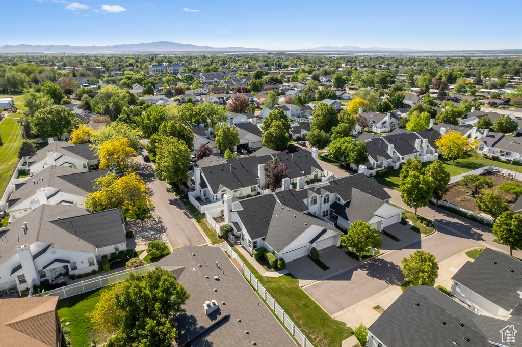 Aerial view of residential area with mountains