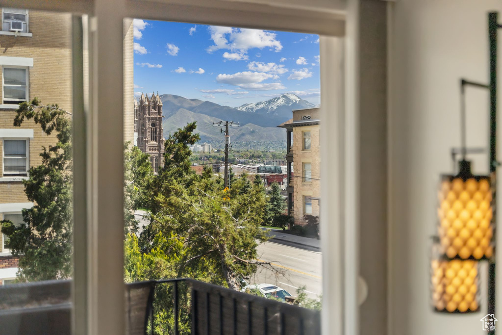 Doorway to outside with a mountain view
