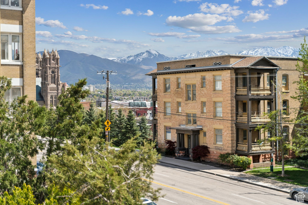 View of building exterior featuring a mountain view