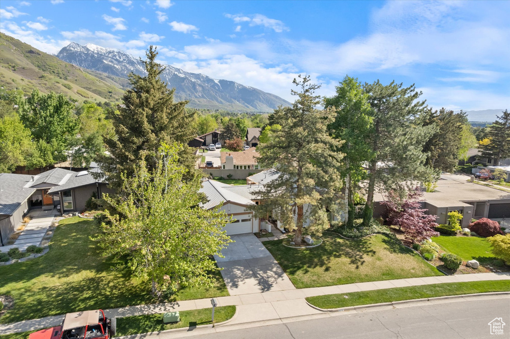 Aerial perspective of suburban area featuring mountains