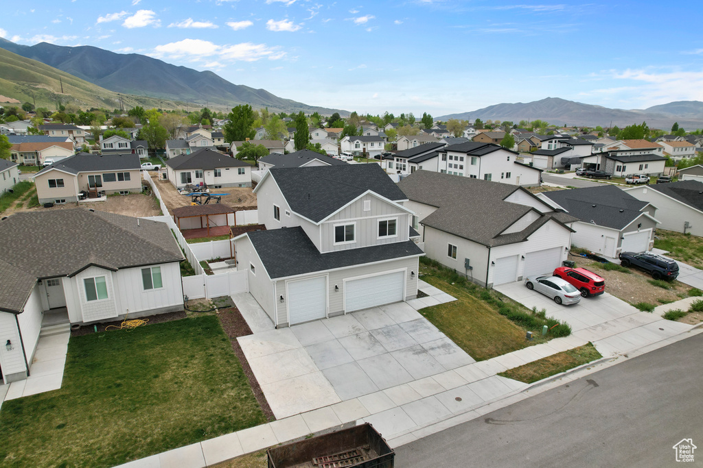 Aerial view of residential area with mountains