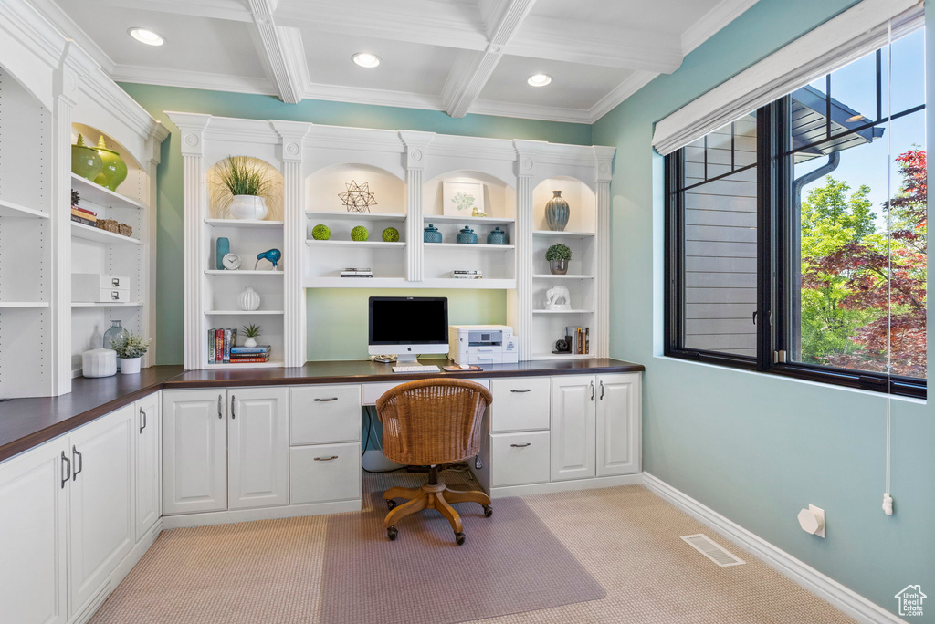 Office space with built in study area, light carpet, beam ceiling, recessed lighting, and ornamental molding