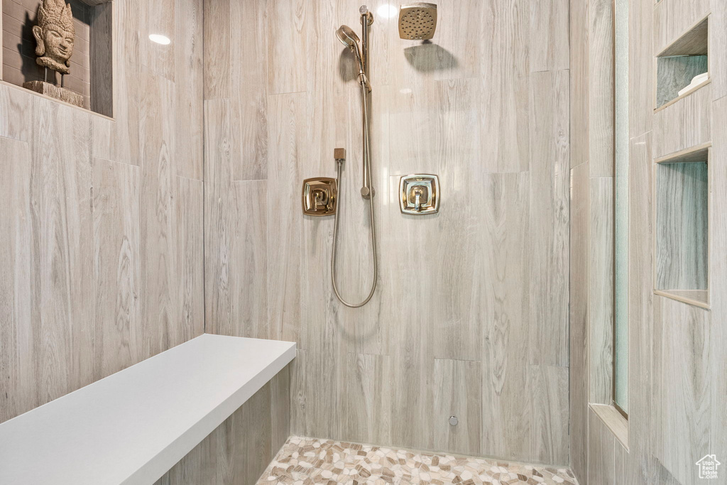 Bathroom with tiled shower