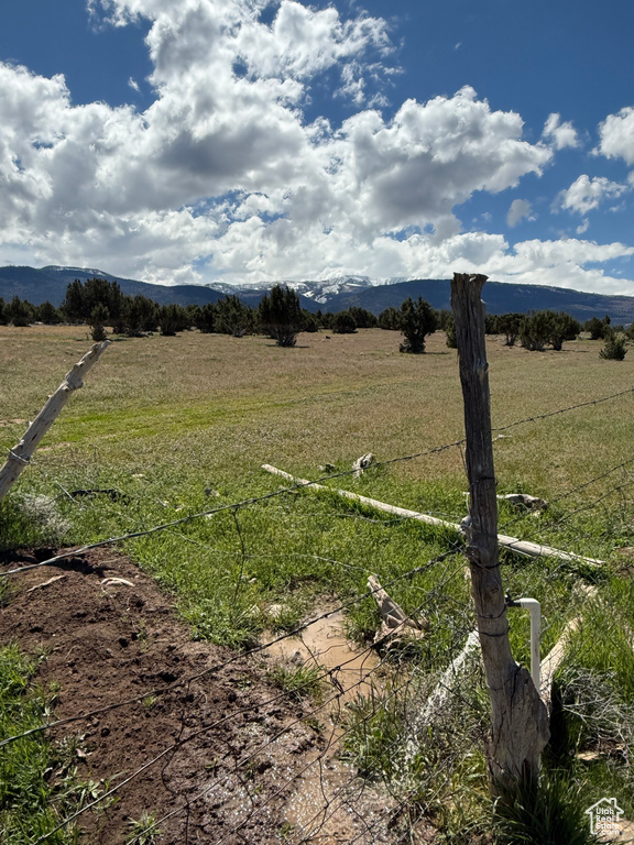View of yard with a view of countryside and a mountain view