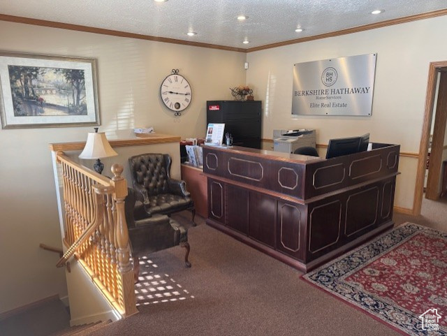 Reception featuring crown molding, recessed lighting, and a textured ceiling