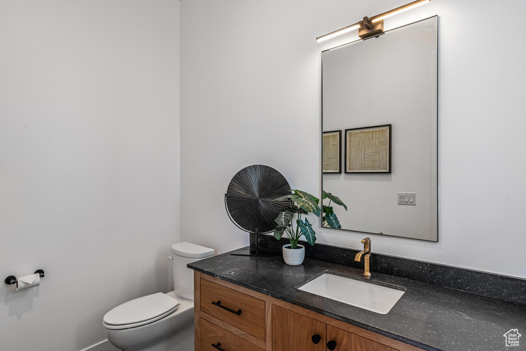 Bathroom with toilet and vanity