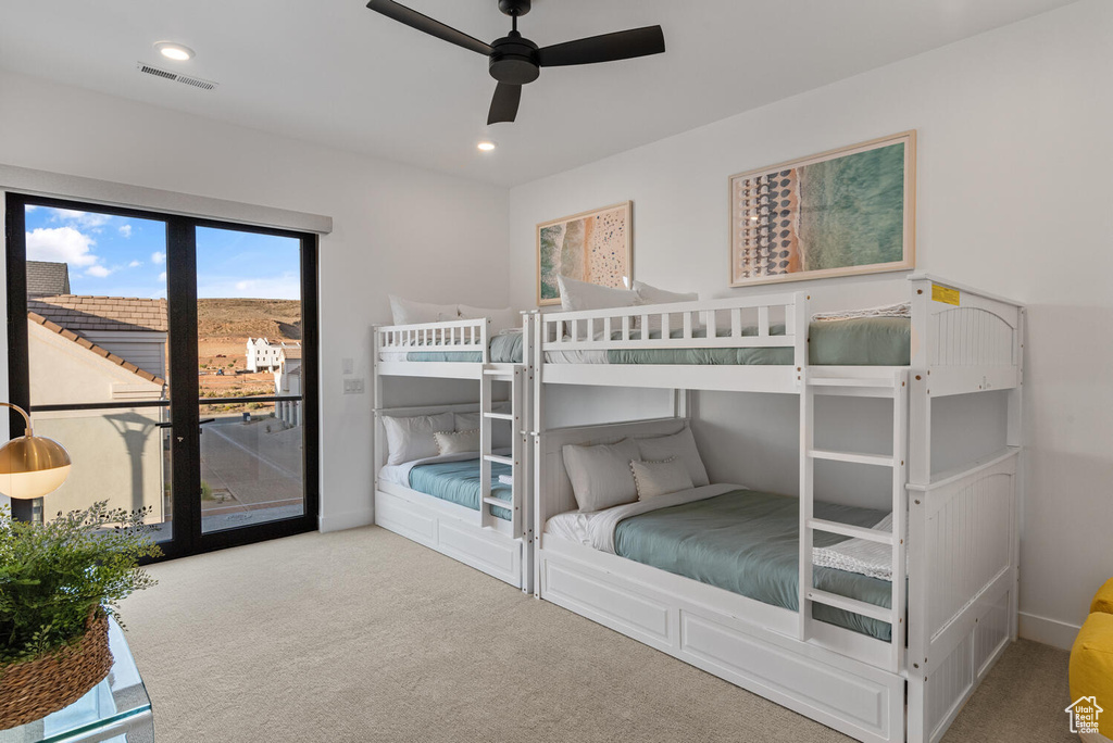 Carpeted bedroom featuring access to outside and recessed lighting