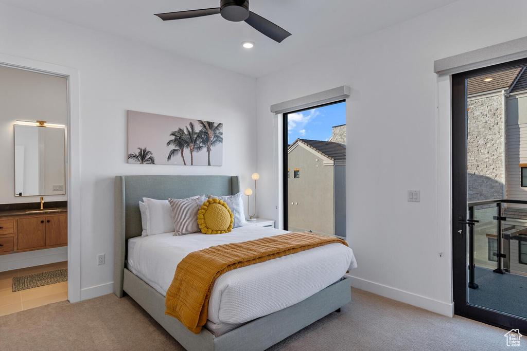 Bedroom featuring light carpet, baseboards, access to outside, connected bathroom, and recessed lighting