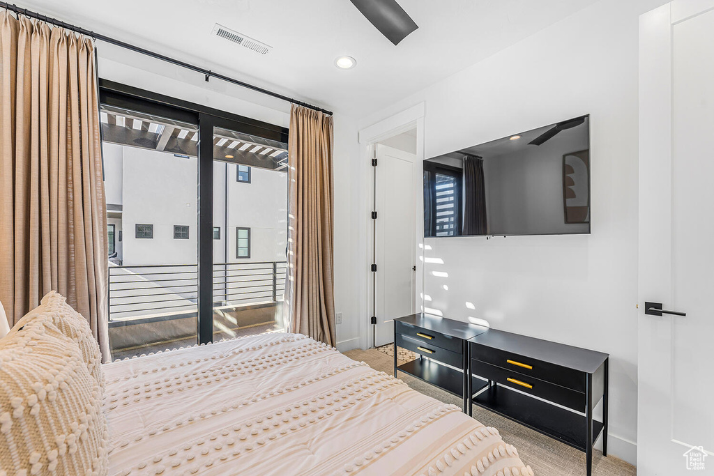 Carpeted bedroom with access to exterior, baseboards, ceiling fan, and recessed lighting