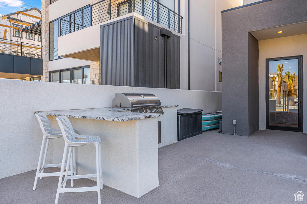 View of patio / terrace featuring an outdoor kitchen