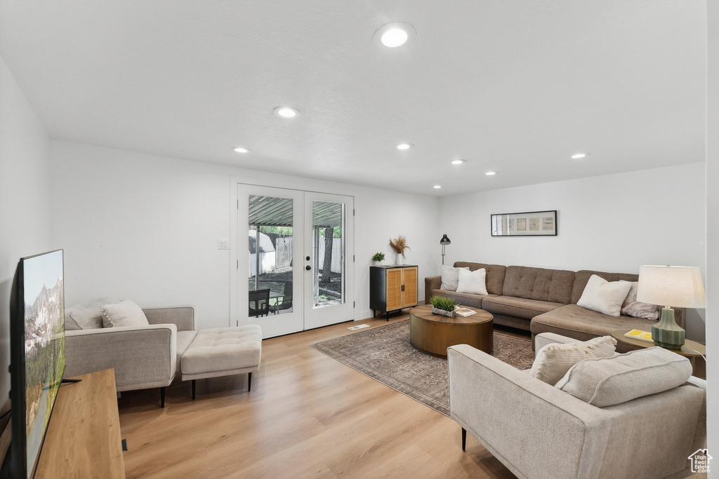 Living room featuring recessed lighting and light wood finished floors