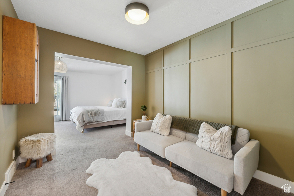 Bedroom with carpet and baseboards
