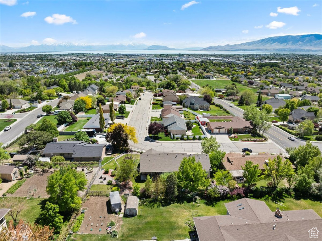 Aerial view of residential area with a mountain backdrop