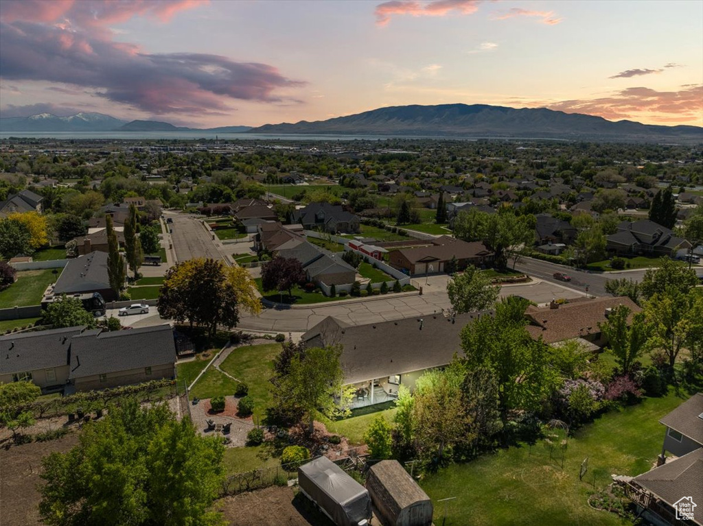 View of property location featuring a mountain backdrop and nearby suburban area