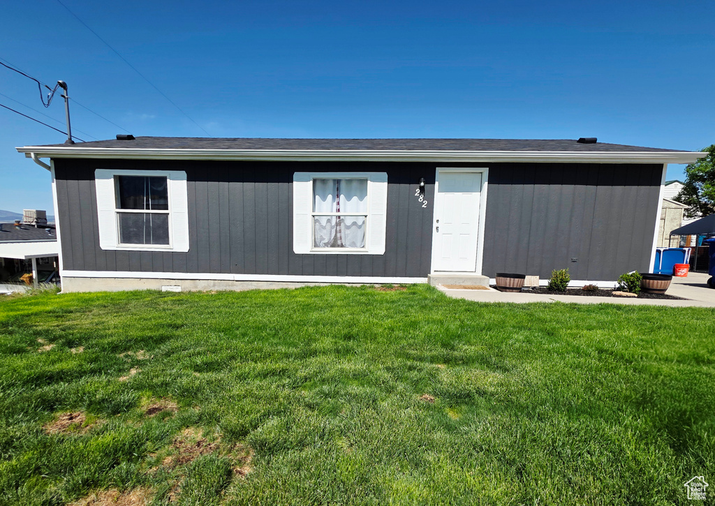 View of front of home with a front lawn