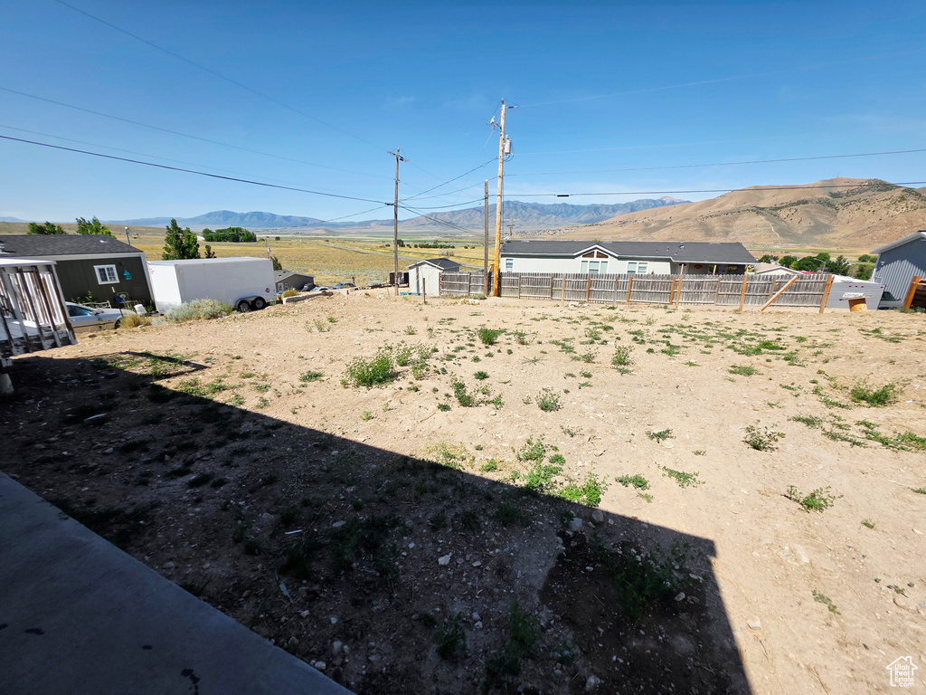 View of yard featuring a mountain view