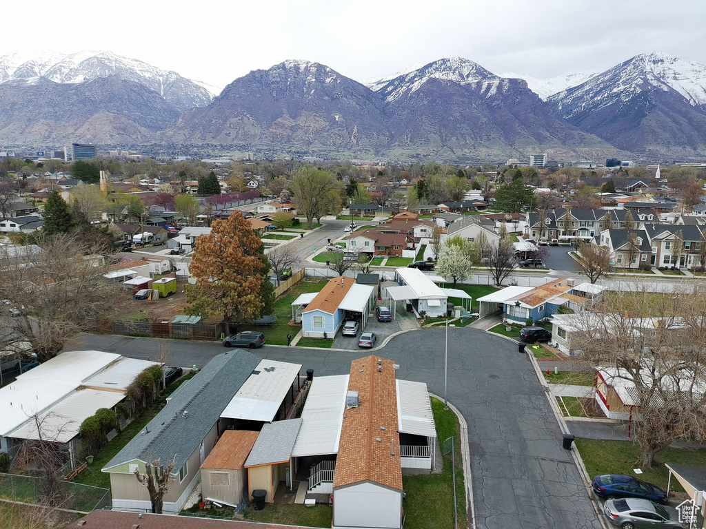 Birds eye view of property featuring a residential view and a mountain view