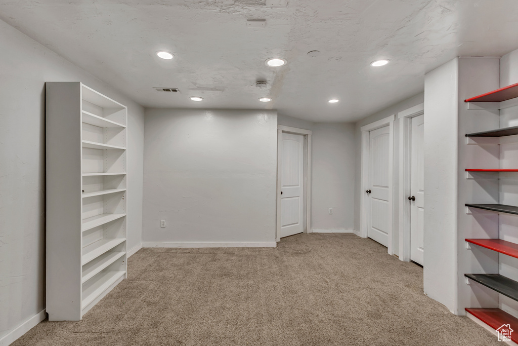 Below grade area featuring carpet flooring, recessed lighting, and baseboards