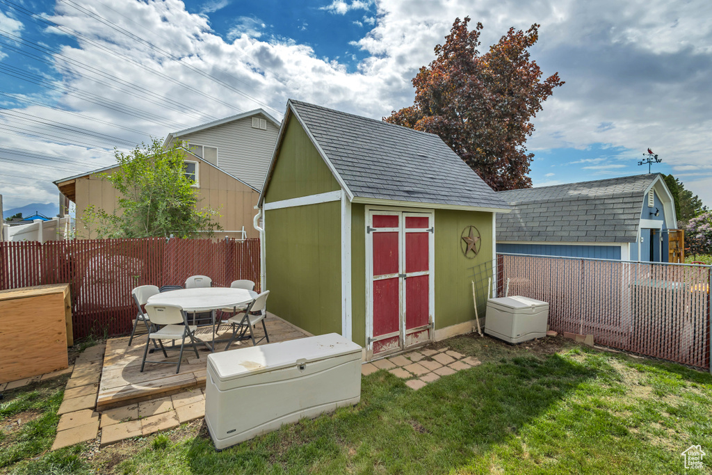 View of shed with outdoor dining space
