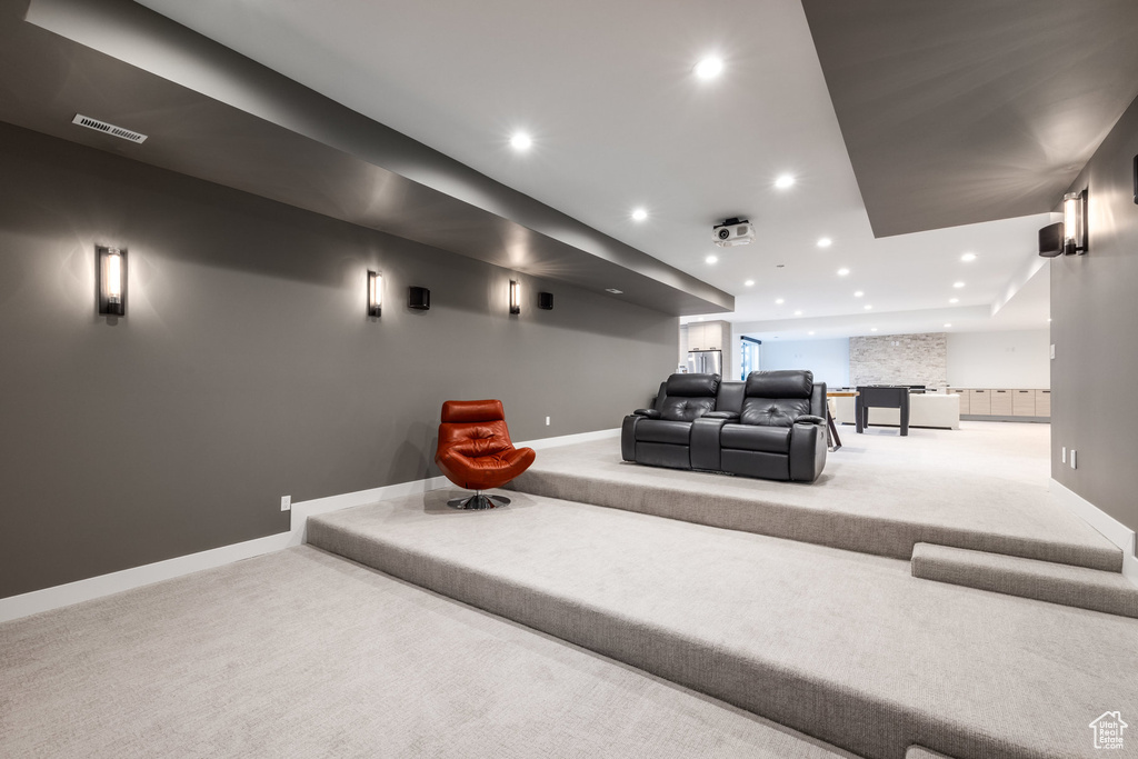 Cinema room featuring carpet, baseboards, and recessed lighting