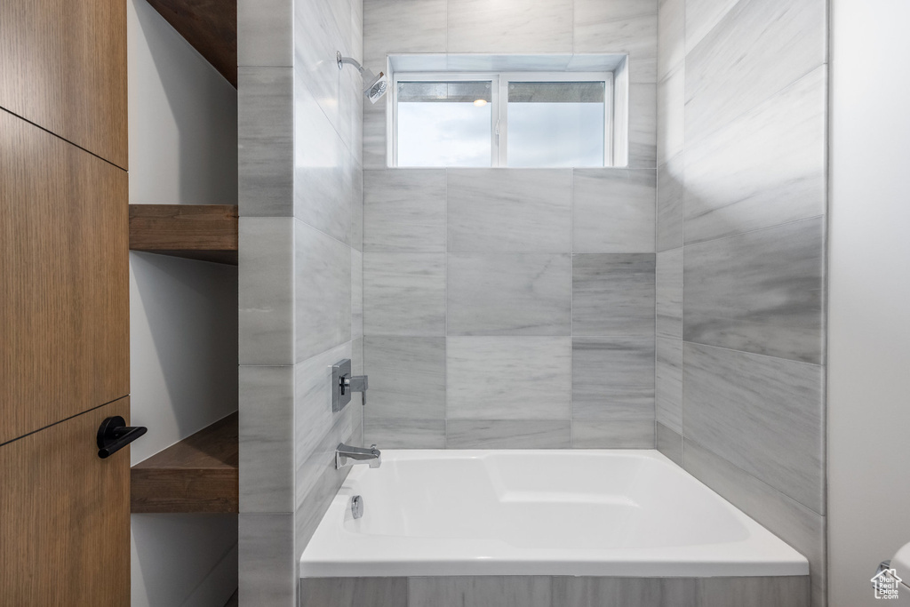 Full bath with shower / washtub combination and toilet