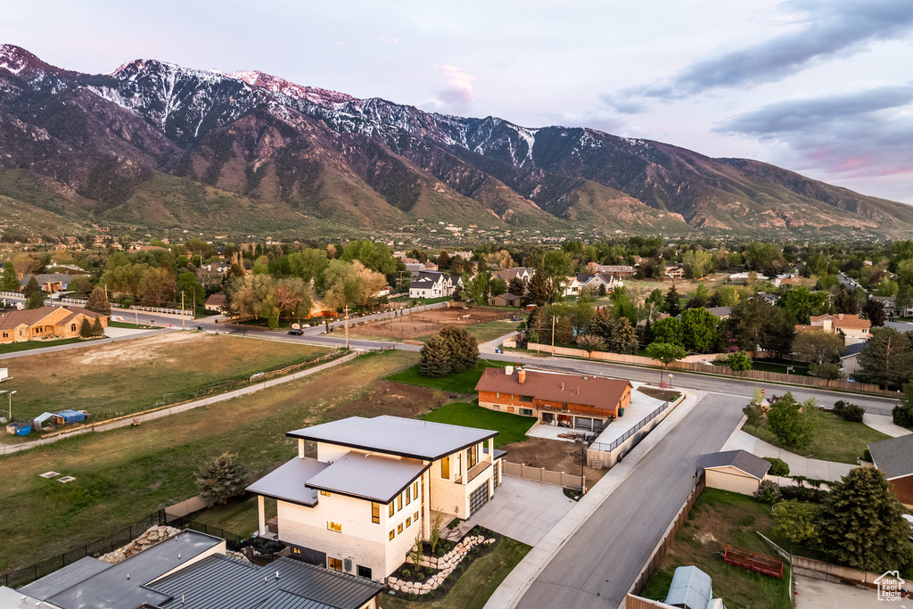 View of mountain background featuring nearby suburban area