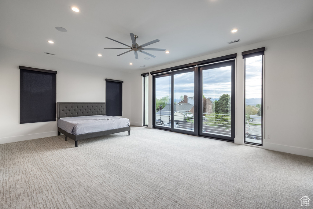 Carpeted bedroom with access to outside, baseboards, recessed lighting, and ceiling fan