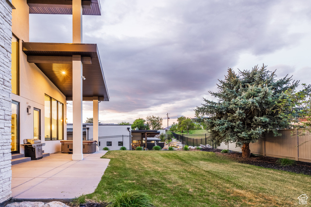 View of yard with a patio