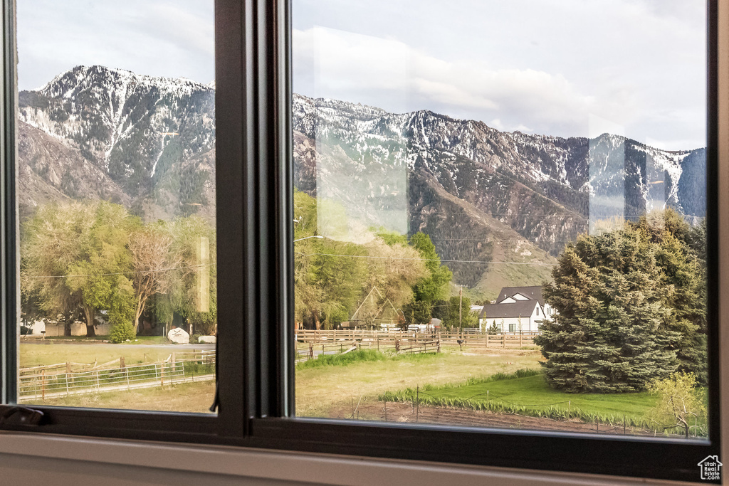 View of mountain background featuring rural landscape