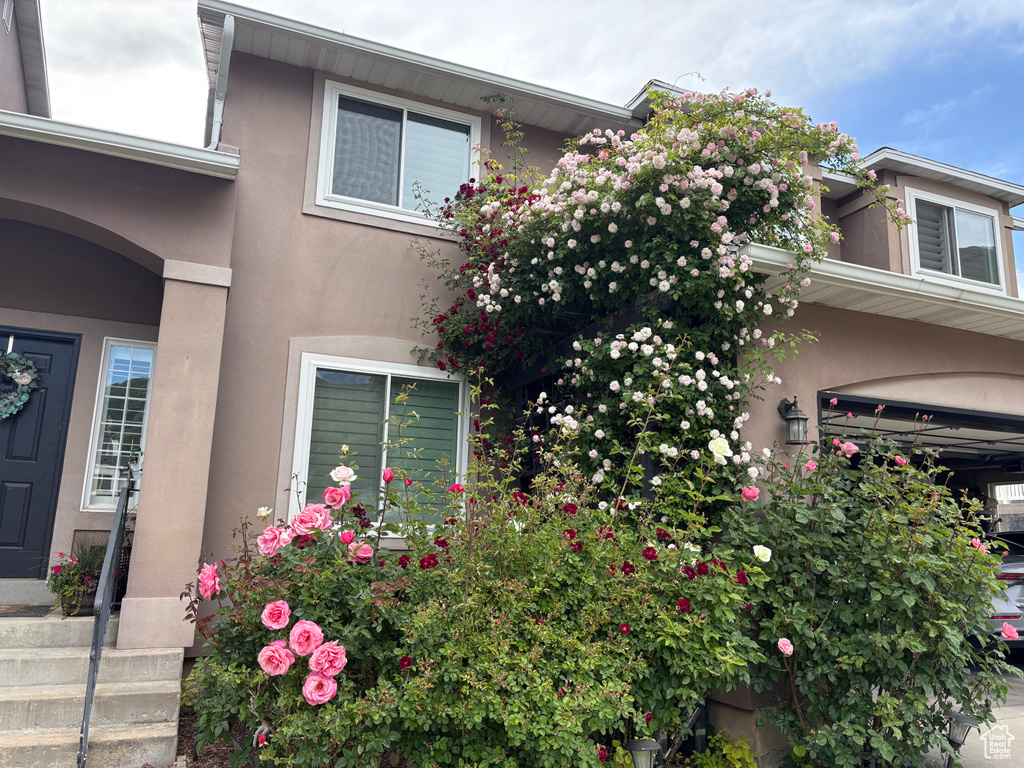 View of side of property with stucco siding