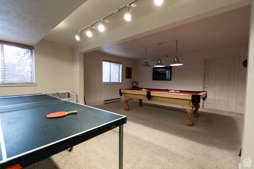Playroom featuring baseboard heating, rail lighting, carpet flooring, and billiards