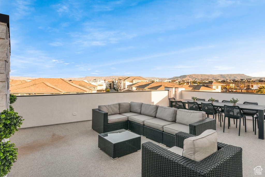View of patio featuring a residential view, outdoor dining space, outdoor lounge area, and a mountain view