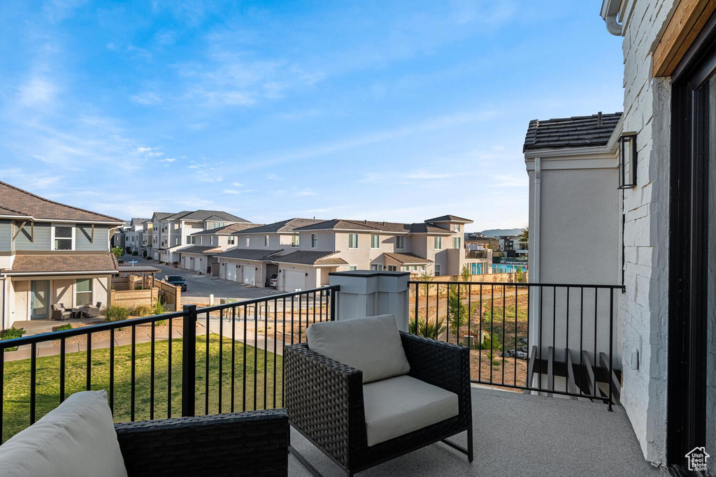 Balcony featuring a residential view