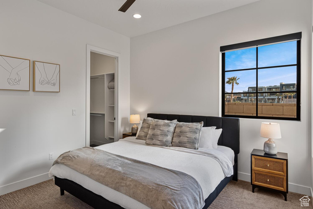 Bedroom with carpet floors, baseboards, a spacious closet, recessed lighting, and a closet