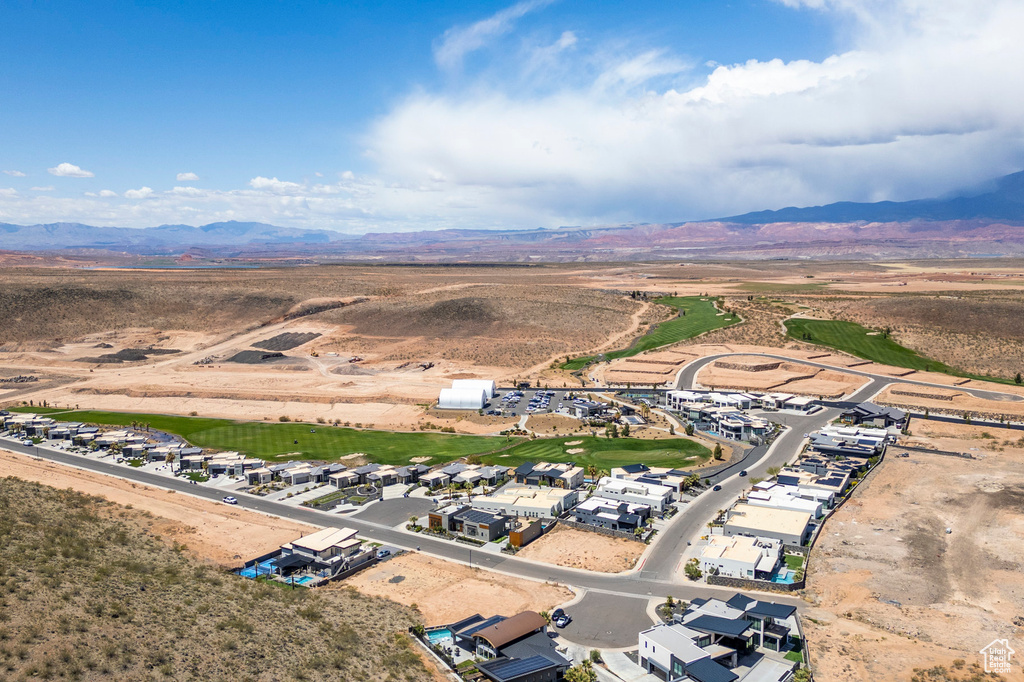 Bird's eye view of a mountainous background and a desert landscape