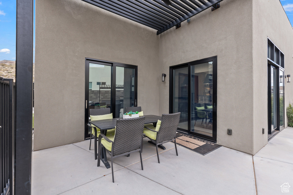 View of patio with outdoor dining space