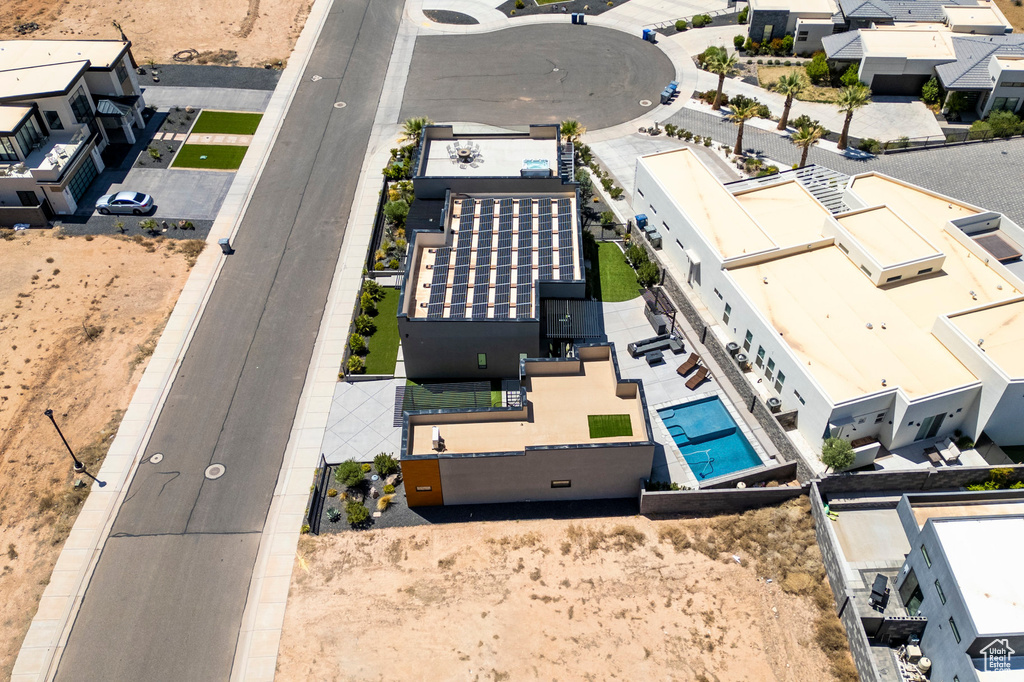 Aerial view of residential area featuring a pool area