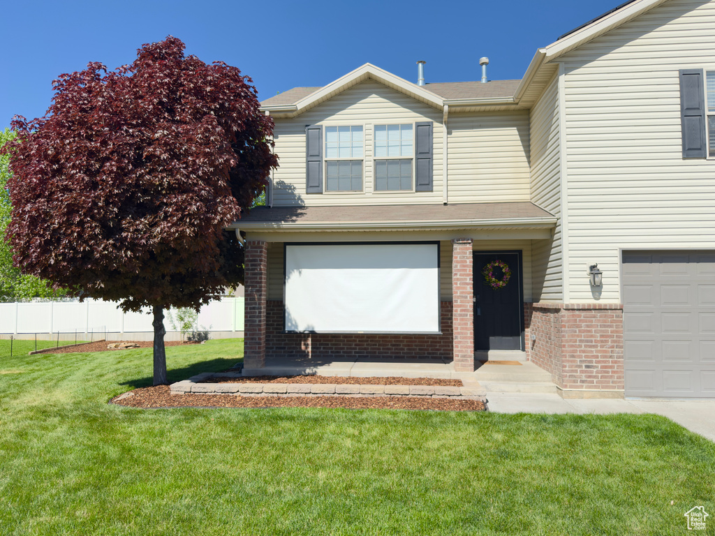 View of front of house featuring brick siding