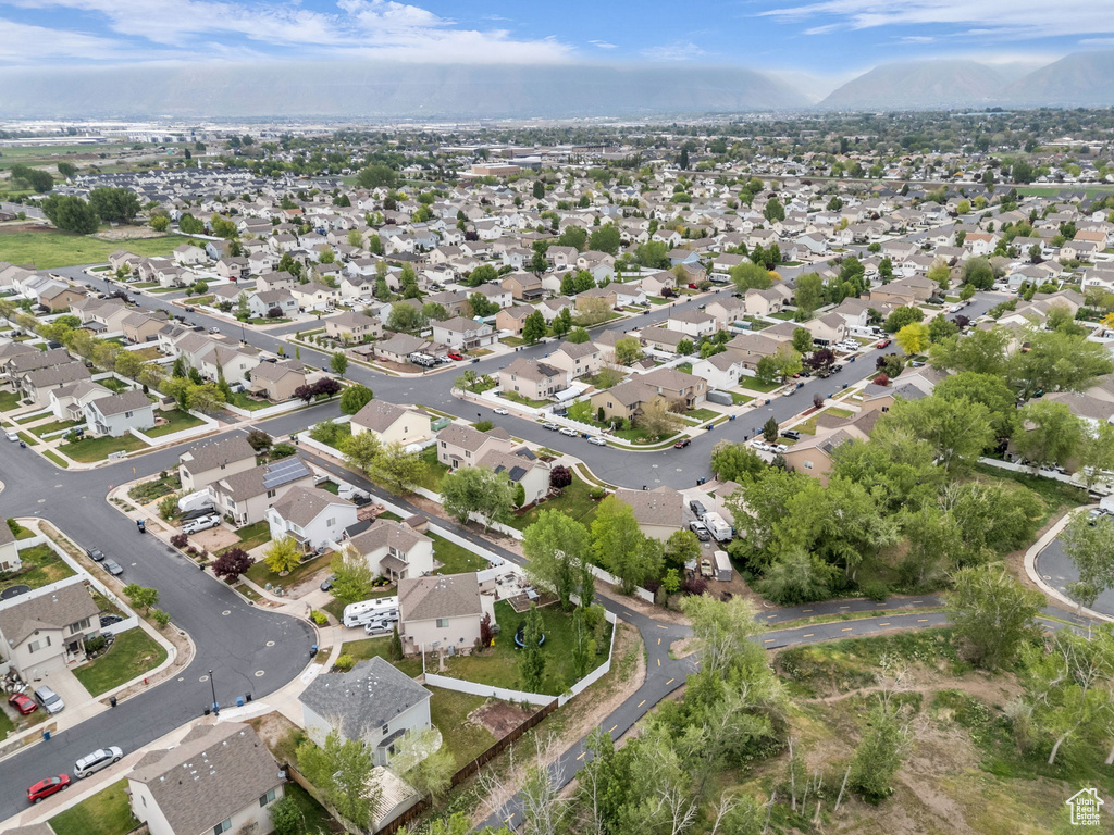Birds eye view of property featuring a residential view and a mountain view