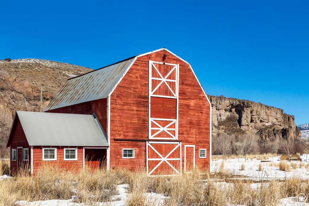 View of barn featuring a mountain view