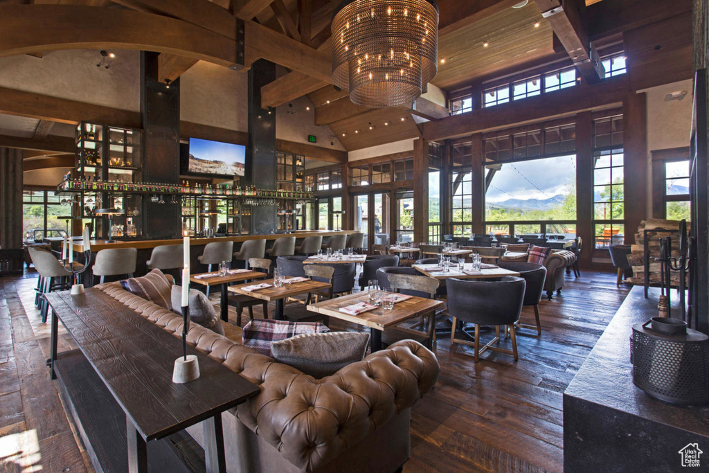Community lobby with a towering ceiling and beam ceiling