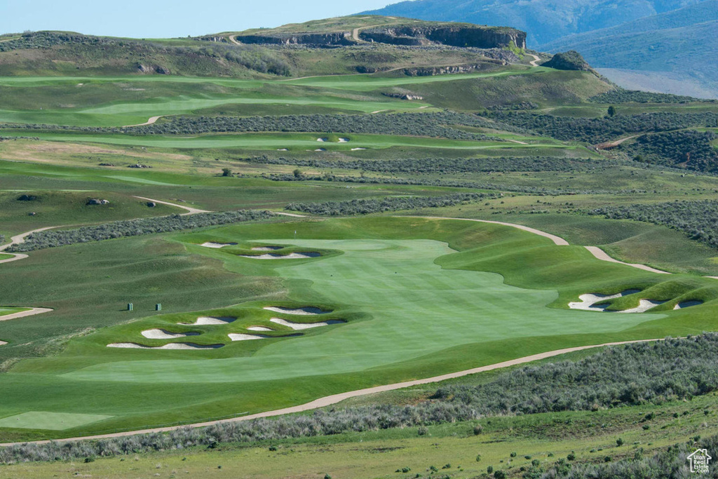 Bird's eye view of mountains and a local golf course